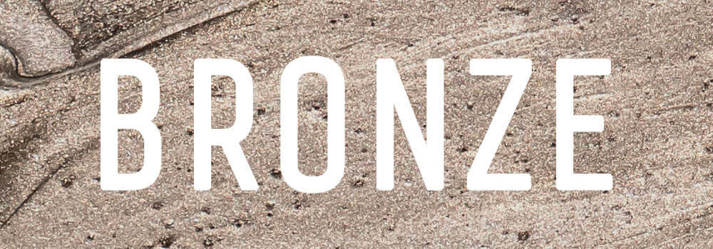 Bronze stand på ski udstyr